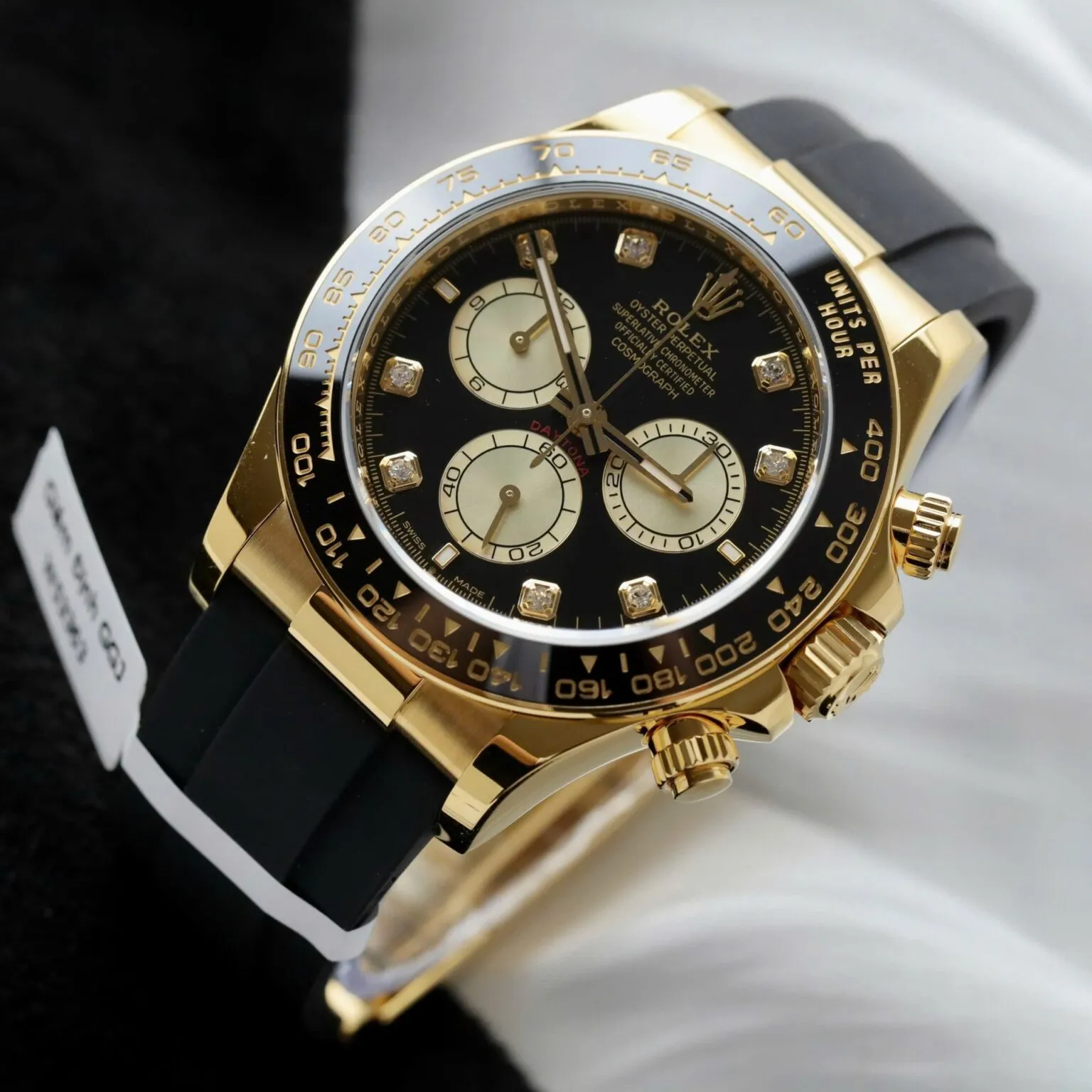 Daytona schwarzes Zifferblatt Schwarz Lünette Goldfarben Case Oysterflex Armband