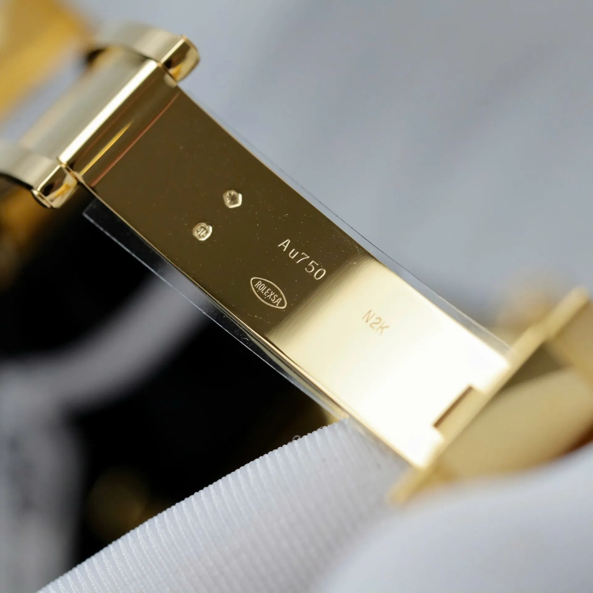 Daytona schwarzes Zifferblatt Schwarz Lünette Goldfarben Case Oysterflex Armband