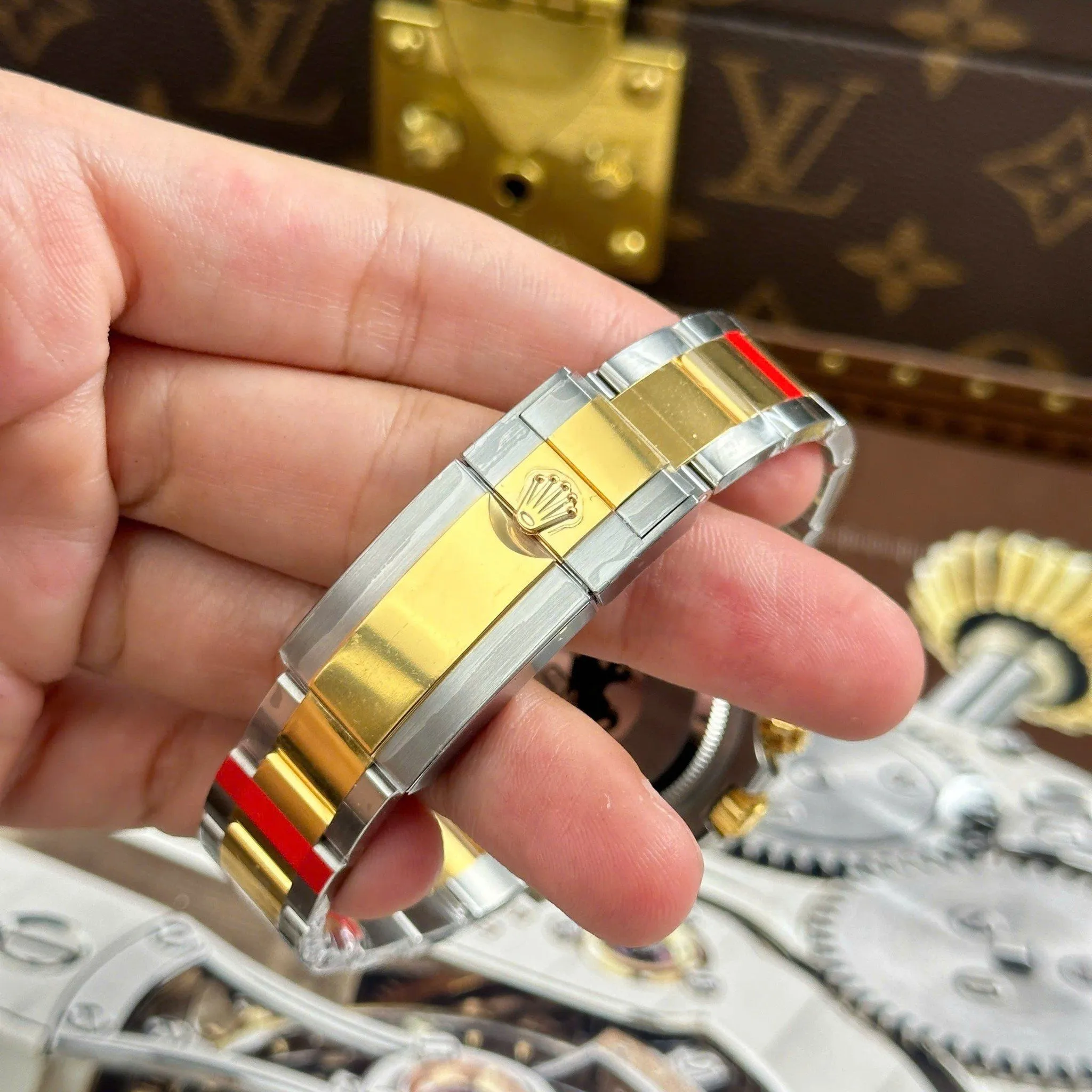 Daytona schwarzes Zifferblatt Gold Lünette Two Tone Oyster Armband