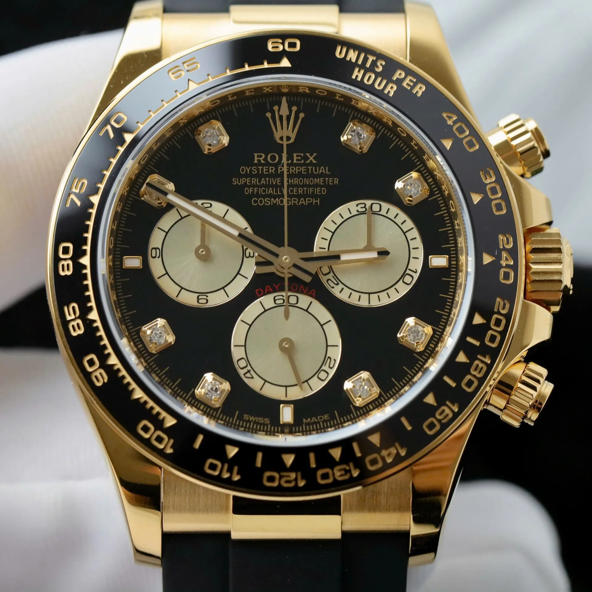 Daytona schwarzes Zifferblatt Schwarz Lünette Goldfarben Case Oysterflex Armband