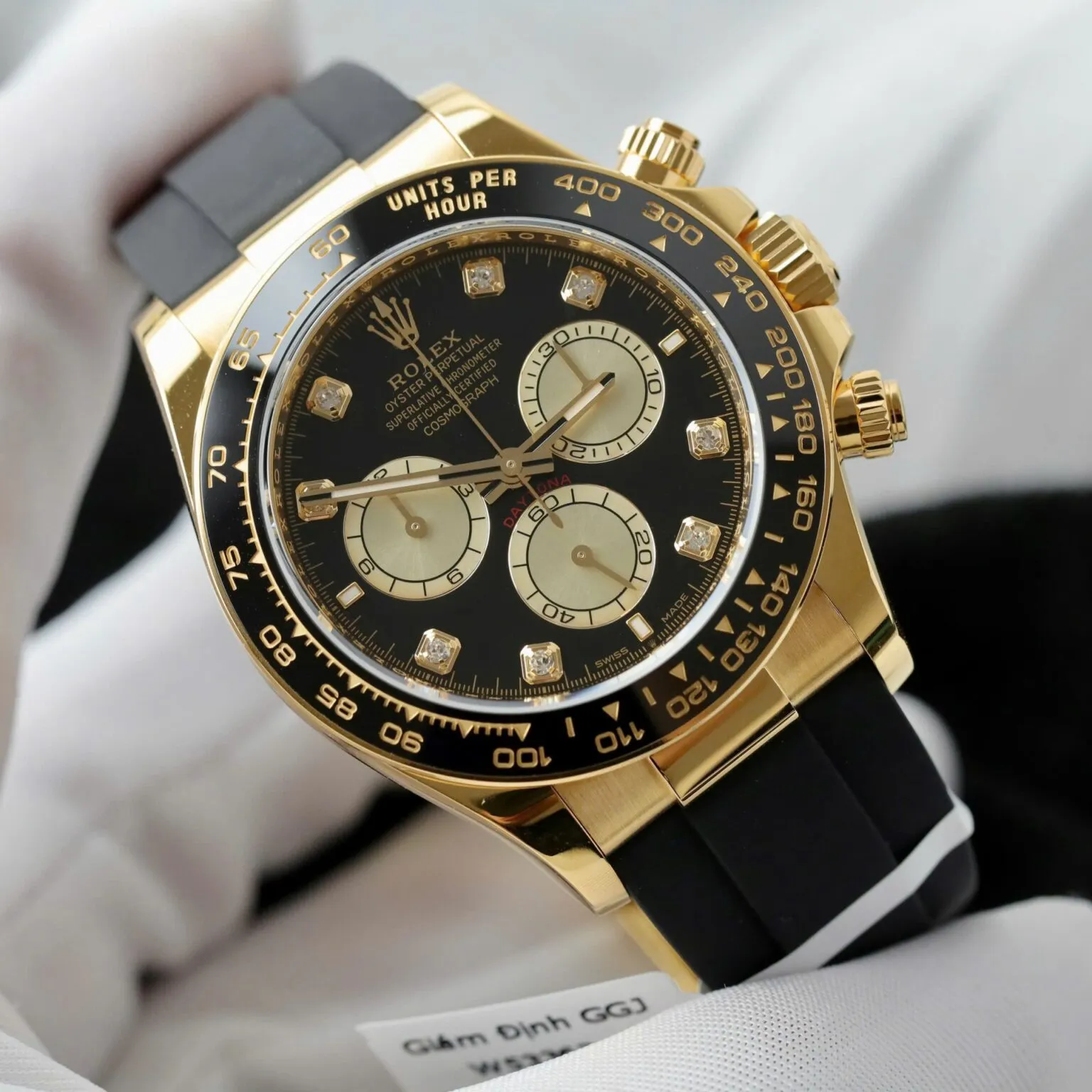 Daytona schwarzes Zifferblatt Schwarz Lünette Goldfarben Case Oysterflex Armband