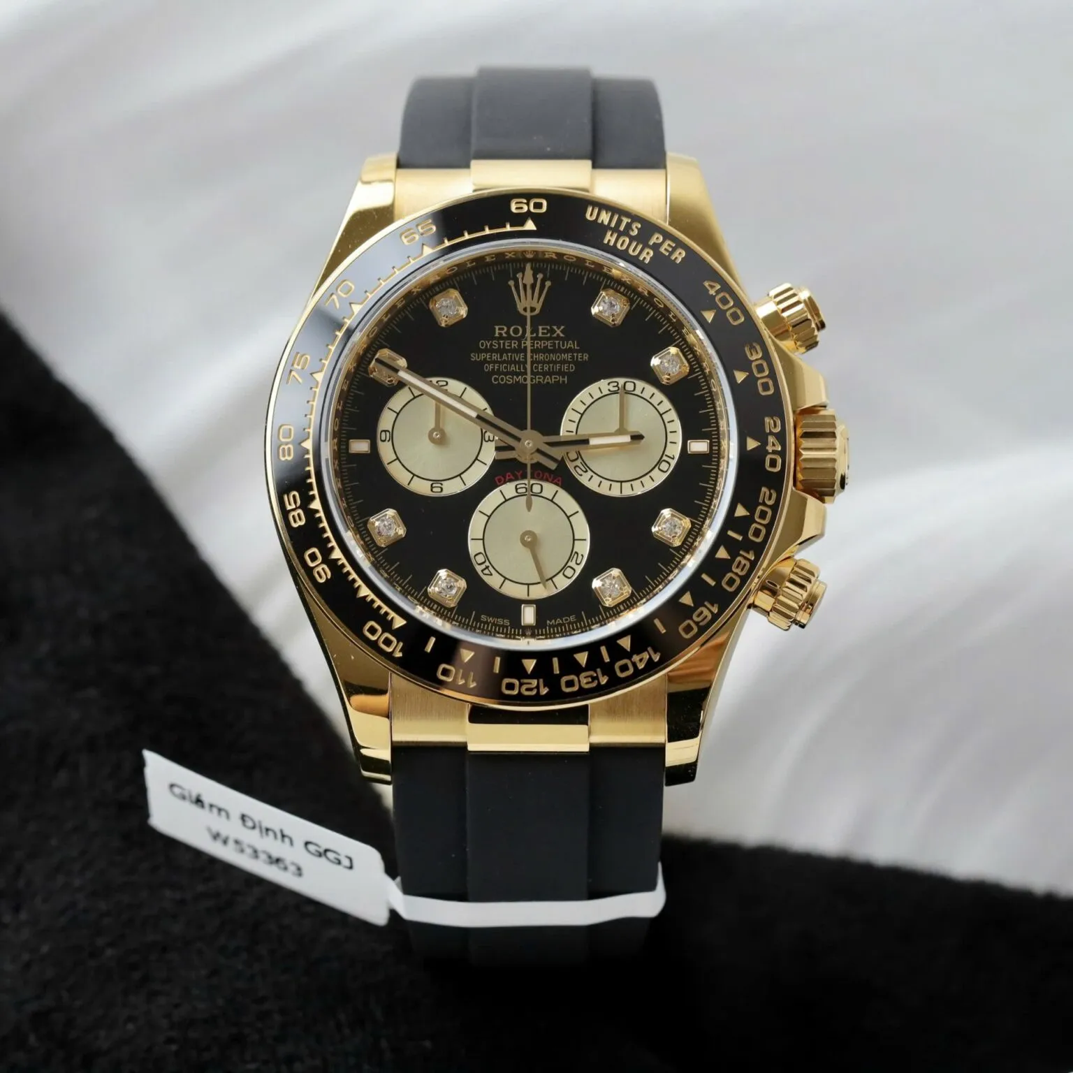 Daytona schwarzes Zifferblatt Schwarz Lünette Goldfarben Case Oysterflex Armband